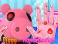 Permainan Piggy memperlakukan tangannya  secara online