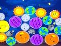 Permainan Gabungkan Planet Bahagia  secara online