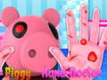Permainan Piggy memperlakukan tangannya  secara online